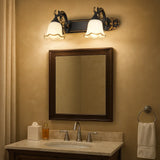 Blumenförmige Spiegelleuchte mit drehbarem Lampenkopf