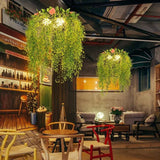 Flos Hängeleuchte für Restaurant mit Blumendekoration - Clowas.de