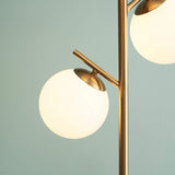 Goldene Stehleuchte 3 Kugeln weiß - Clowas.de