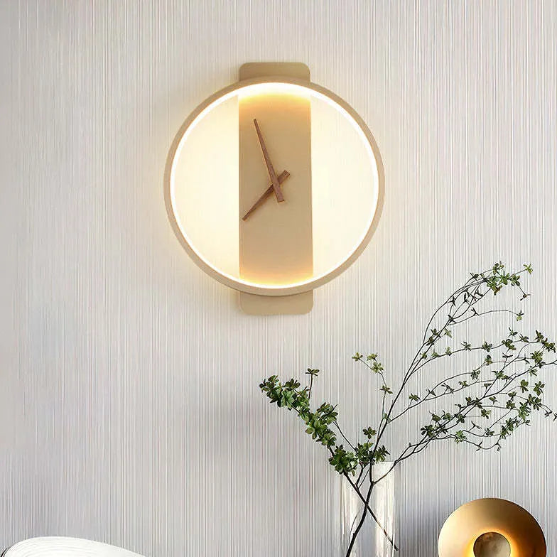 Runde Wandleuchte mit modernem und minimalistischem Uhrendesign - Clowas.de